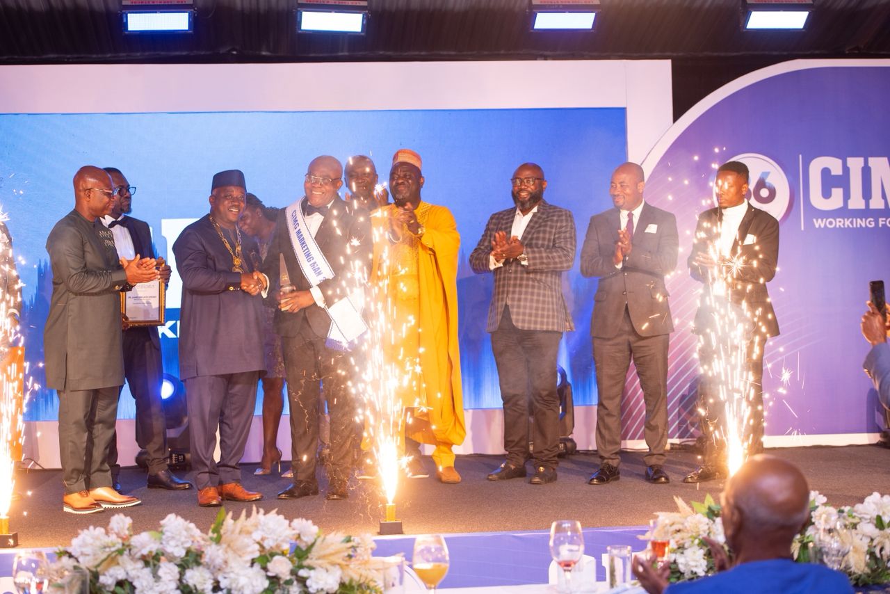 Dr. Orleans-Lindsay receiving award